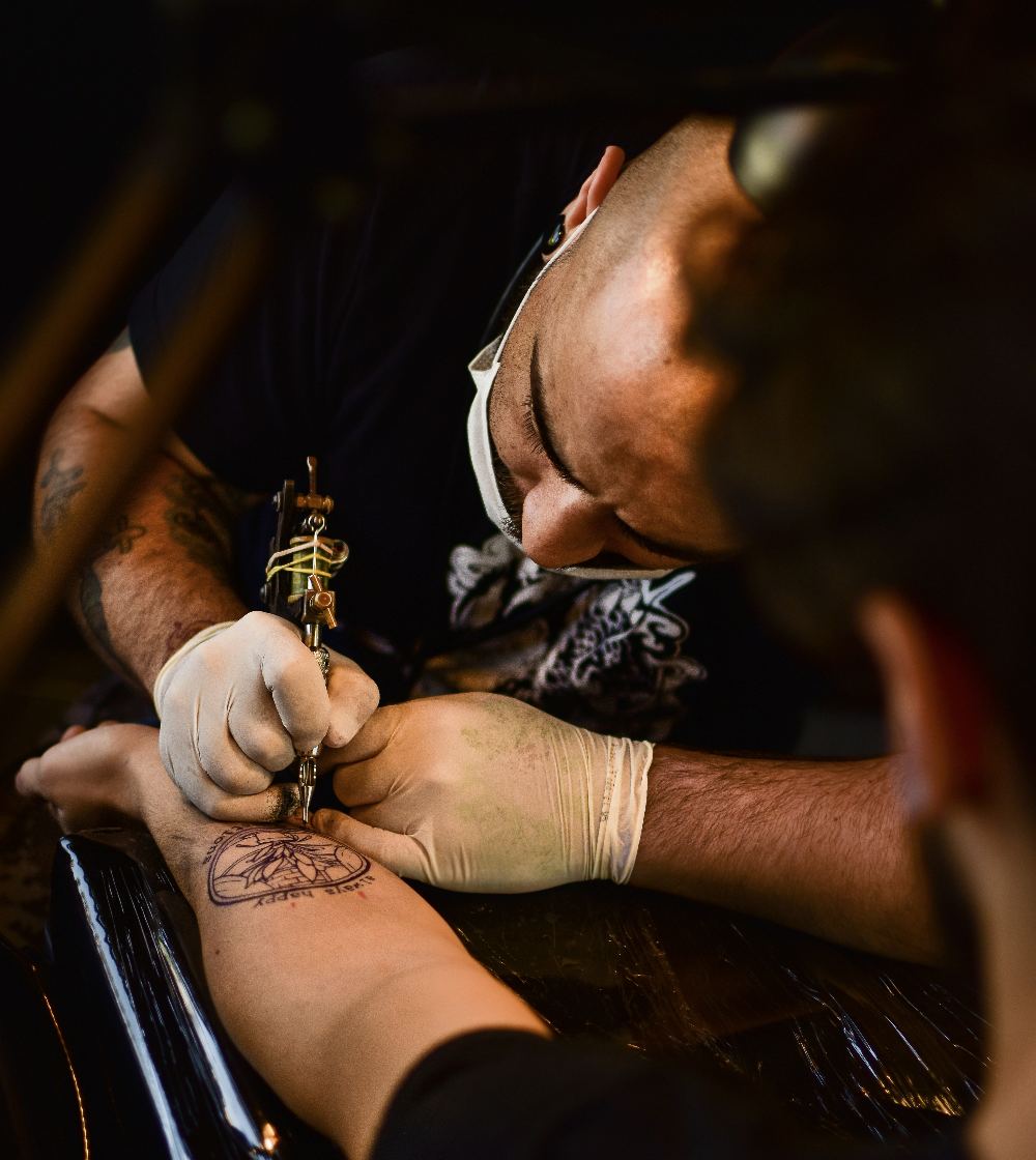 A tattoo artist at work